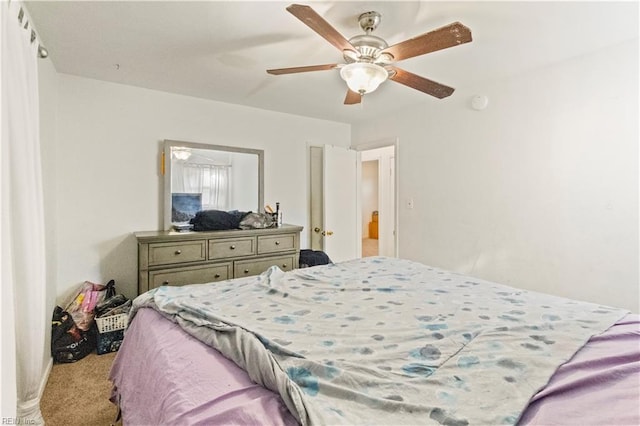 bedroom with carpet flooring and a ceiling fan