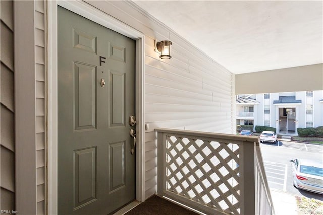 doorway to property featuring a balcony