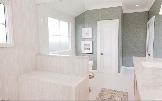 bathroom featuring vaulted ceiling