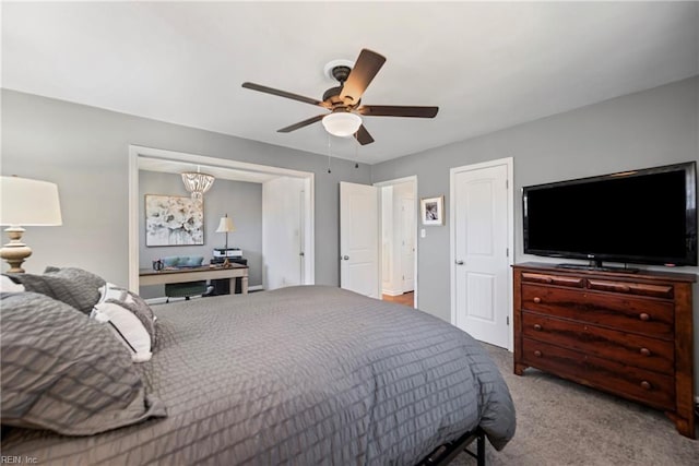 carpeted bedroom with a ceiling fan