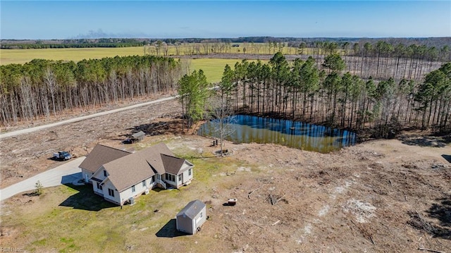 birds eye view of property with a rural view