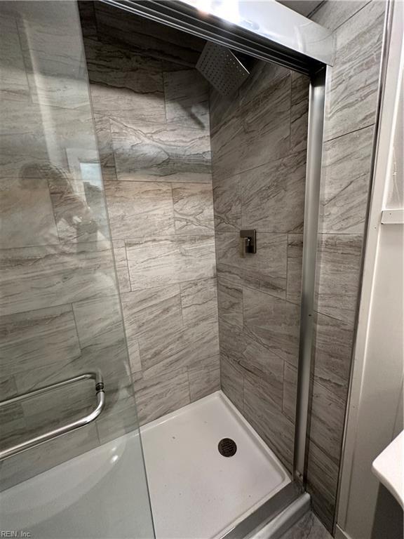 bathroom featuring a stall shower