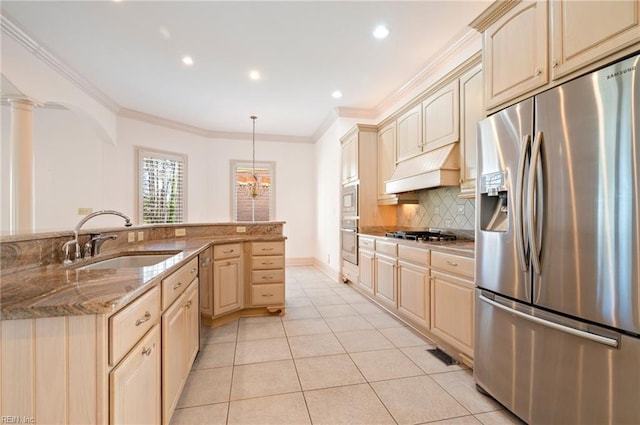 kitchen with tasteful backsplash, custom range hood, ornamental molding, appliances with stainless steel finishes, and a sink