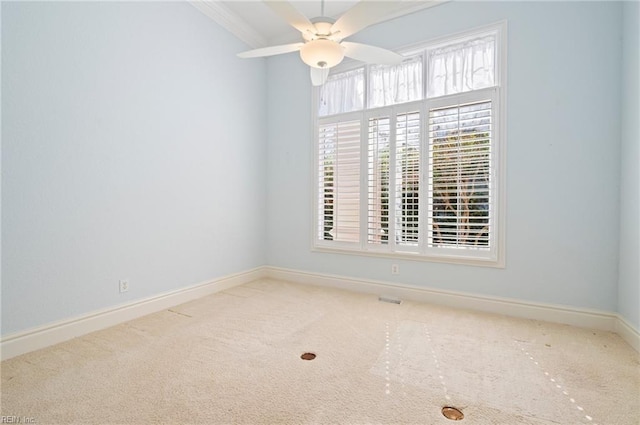 unfurnished room with baseboards, carpet floors, and a ceiling fan