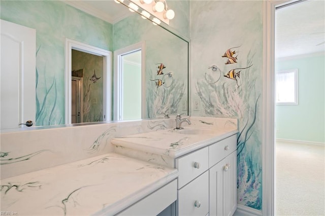 bathroom with vanity and crown molding