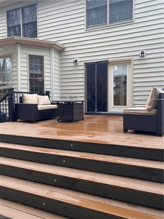 deck featuring an outdoor living space