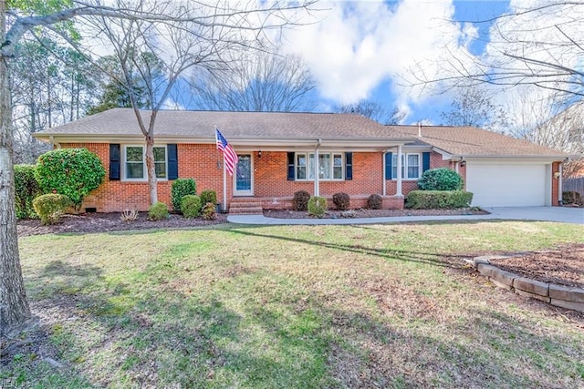 single story home with brick siding, an attached garage, concrete driveway, and a front yard