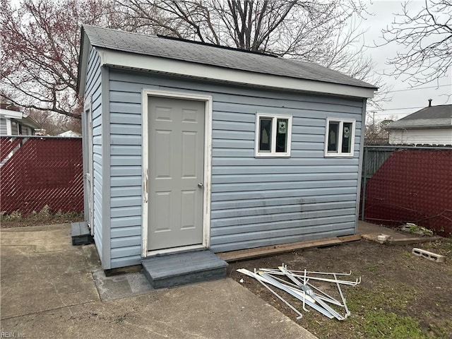 view of outbuilding featuring an outbuilding and a fenced backyard