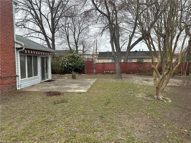 view of yard featuring a patio and fence