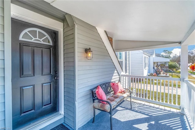 doorway to property with covered porch