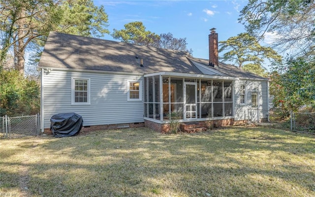 back of property with crawl space, a lawn, a fenced backyard, and a gate