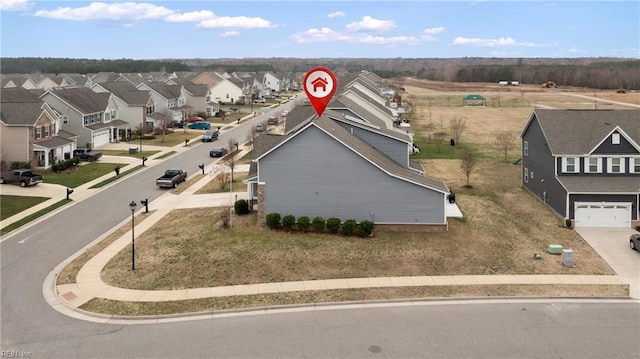 drone / aerial view with a residential view