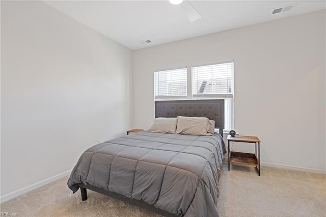 bedroom featuring visible vents, baseboards, and carpet floors