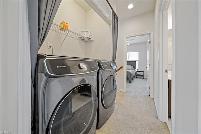 washroom with washer and clothes dryer, recessed lighting, and carpet floors