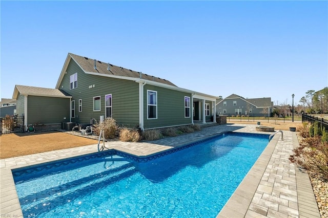 view of pool featuring a fenced in pool, a patio, and a fenced backyard