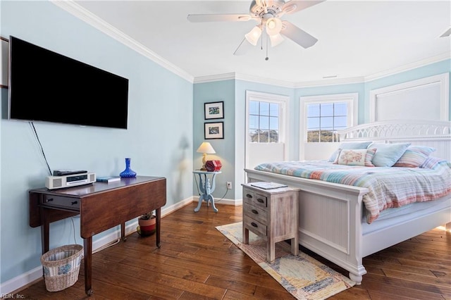 bedroom featuring crown molding, a ceiling fan, baseboards, and wood-type flooring