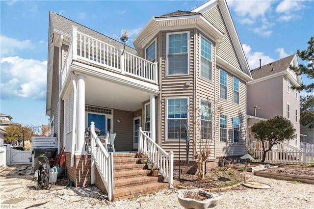 view of front of property with fence