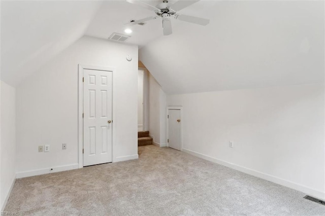 bonus room with visible vents, carpet flooring, ceiling fan, and vaulted ceiling