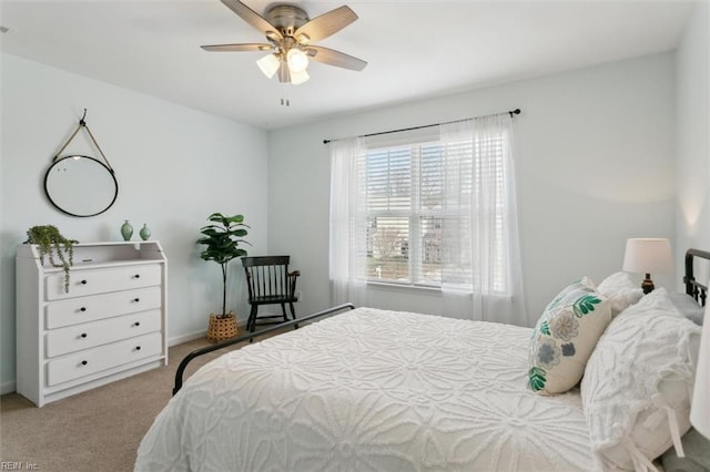 carpeted bedroom featuring a ceiling fan