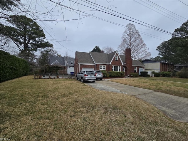 view of front of house featuring a chimney, a front yard, and fence