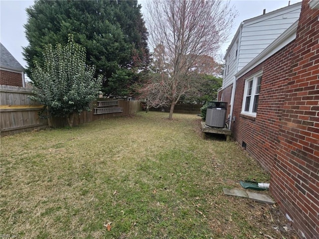 view of yard with a fenced backyard