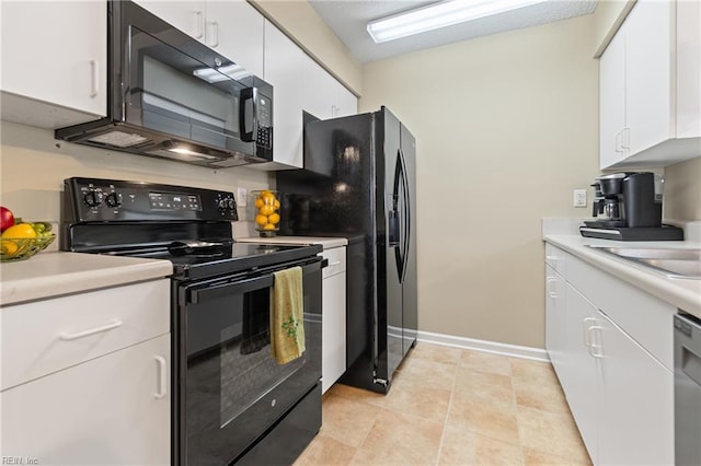 3853 Lasalle Dr Unit 110, Virginia Beach, VA 23453 - kitchen featuring black appliances, white cabinets, light countertops, light tile patterned floors, and baseboards