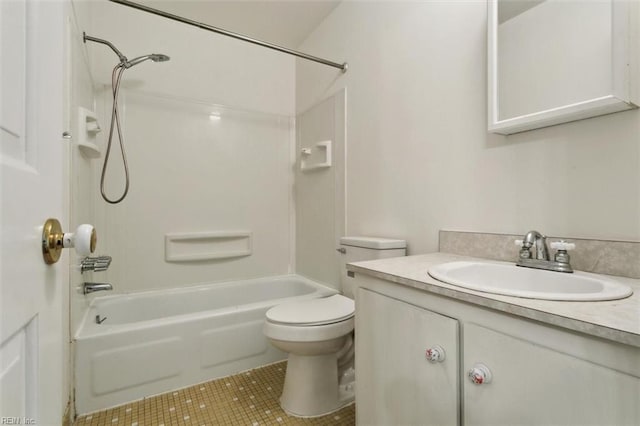 full bath featuring tile patterned flooring, bathing tub / shower combination, toilet, and vanity