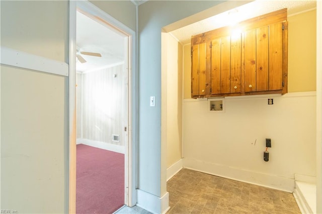 clothes washing area featuring baseboards, washer hookup, light carpet, cabinet space, and a ceiling fan