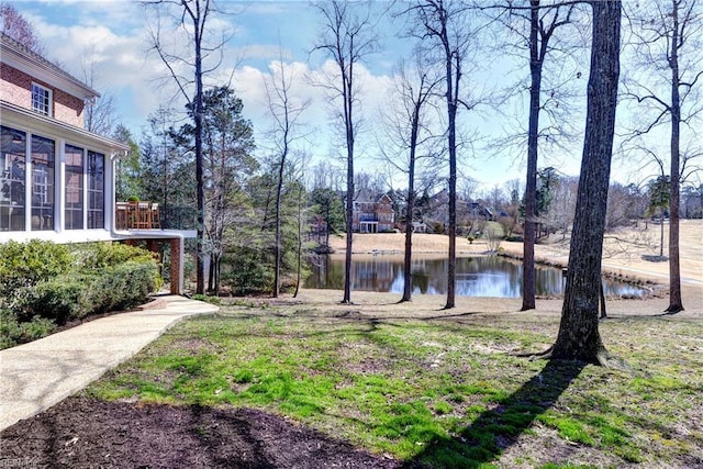 view of yard with a water view