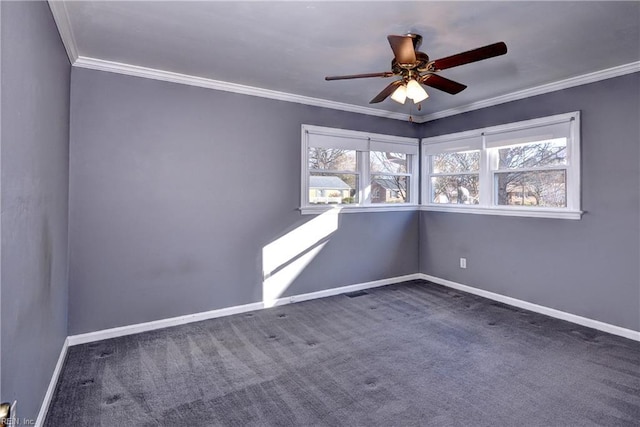 carpeted spare room featuring ceiling fan, baseboards, and ornamental molding