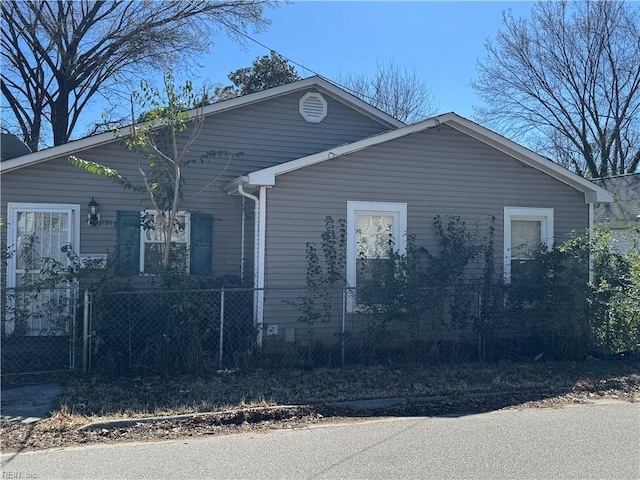 view of front of house with fence