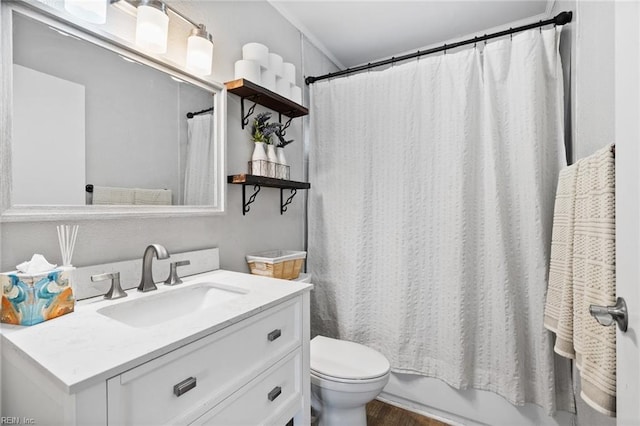 bathroom with shower / bath combination with curtain, toilet, vanity, and wood finished floors