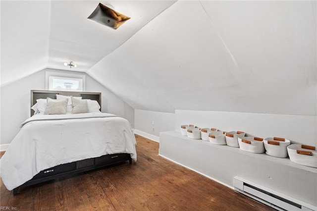 bedroom with baseboards, hardwood / wood-style floors, lofted ceiling, and a baseboard radiator