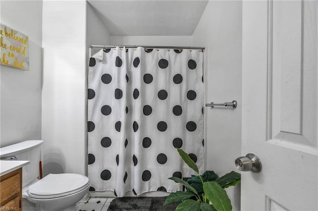 full bathroom with vanity, tile patterned floors, curtained shower, and toilet