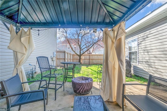 view of patio / terrace with fence