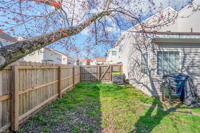 view of yard with a fenced backyard