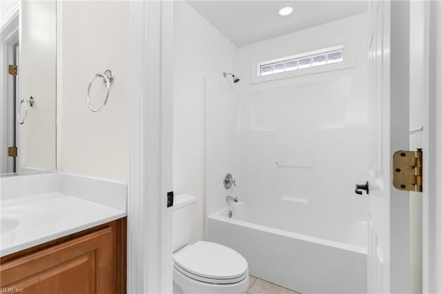 full bath with tub / shower combination, toilet, and vanity