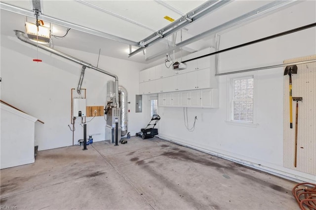 garage featuring electric panel, a garage door opener, and water heater