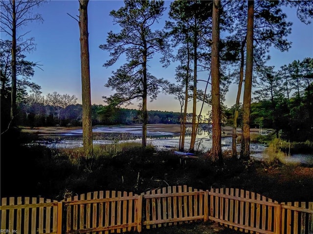 view of water feature featuring fence