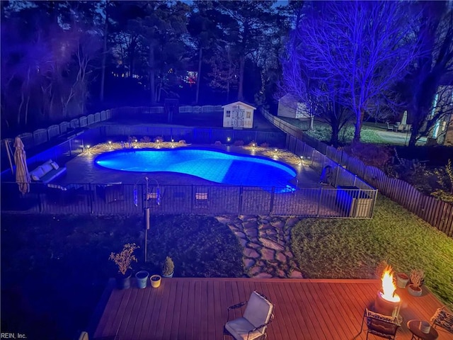 view of swimming pool featuring a fenced in pool and a fenced backyard