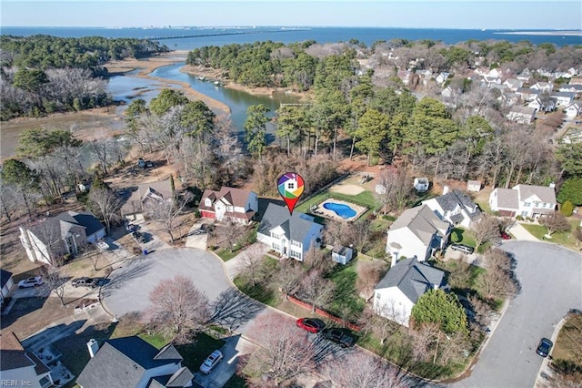 birds eye view of property featuring a residential view and a water view