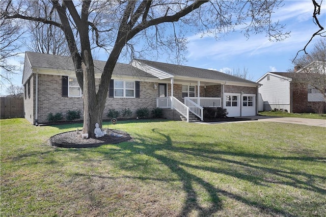 ranch-style house with a porch, fence, brick siding, and a front yard