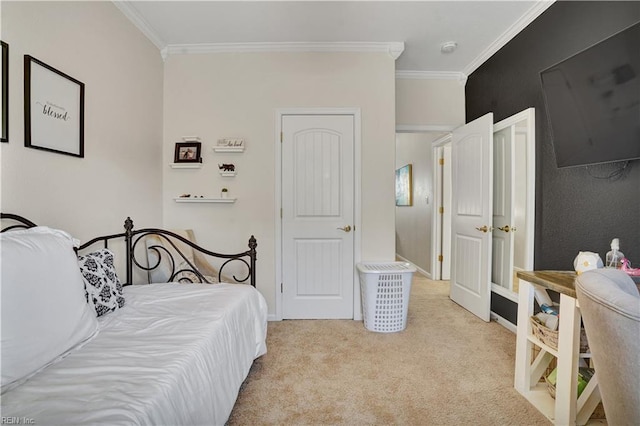 carpeted bedroom with baseboards and crown molding