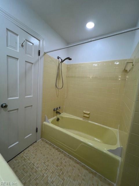 full bathroom with shower / bath combination