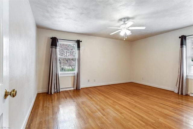 307 Ridgeland Dr, Smithfield, VA 23430 - unfurnished room with light wood-type flooring, plenty of natural light, baseboards, and ceiling fan