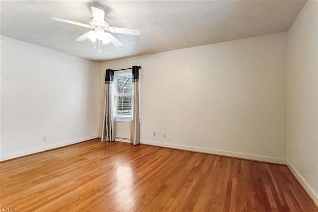 307 Ridgeland Dr, Smithfield, VA 23430 - unfurnished room with light wood-type flooring, baseboards, and a ceiling fan