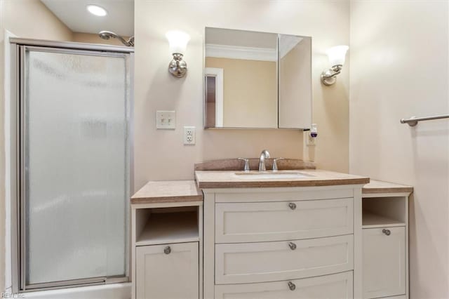 307 Ridgeland Dr, Smithfield, VA 23430 - full bathroom featuring a stall shower, vanity, and ornamental molding