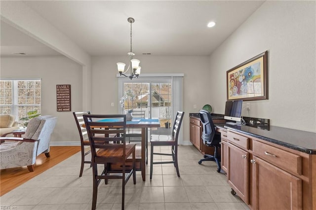 dining area featuring visible vents, baseboards, a chandelier, light tile patterned floors, and recessed lighting