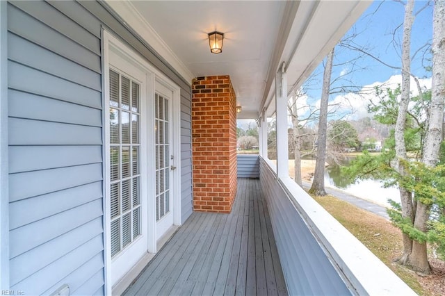 balcony featuring french doors