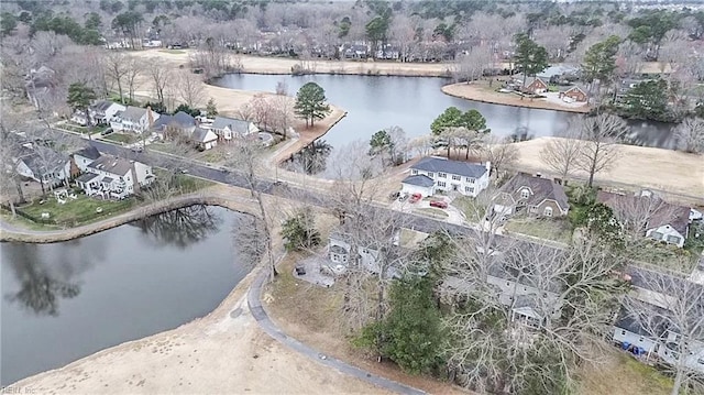 birds eye view of property featuring a residential view and a water view